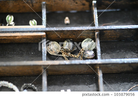 Antique accessories found in an old jewelry box Antique accessories found in an old jewelry box 103879056