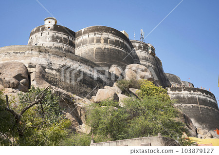 Huge fortification walls of Laxmangarh Fort, a ruined old fort on a hill, it was built by Rao Raja Lakshman Singh of Sikar in 1805, Laxmangarh , Rajasthan, India 103879127