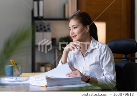 Accountant woman working on laptop and do document, tax, exchange, research, accounting and Financial advisor concept Accountant woman working on laptop and do document, tax, exchange, research, accounting and Financial advisor concept 103879618