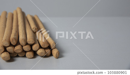 Grissini on the white surface. Fresh italian snack.appetizer 103880901