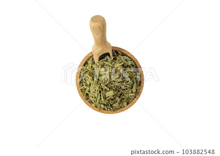 Dried leaves o Lemon verbena in latin Aloysia citrodora in wooden bowl and scoop isolated on white background. Medicinal herb. Dried leaves o Lemon verbena in latin Aloysia citrodora in wooden bowl and scoop isolated on white background. Medicinal herb. 103882548