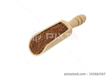 Rooibos tea medium cut in wooden scoop isolated on white background. Rooibos in latin Aspalathus linearis. herb. herbal tea. food ingredient. 103882567