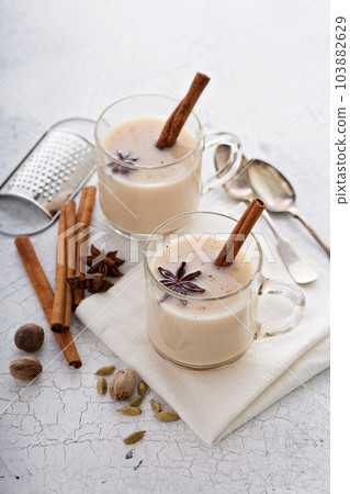 Warm chai tea with winter spices Warm chai tea with winter spices 103882629