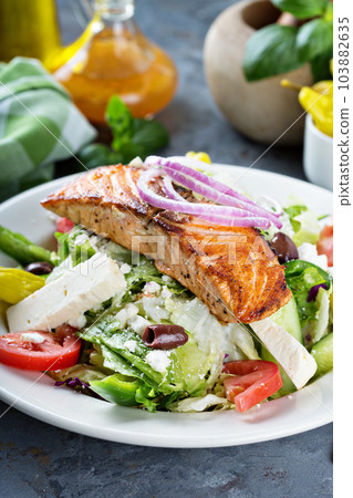 Grilled salmon with fresh salad 103882635