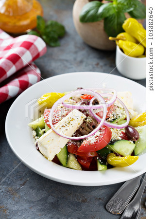 Greek salad with fresh vegetables and feta 103882640