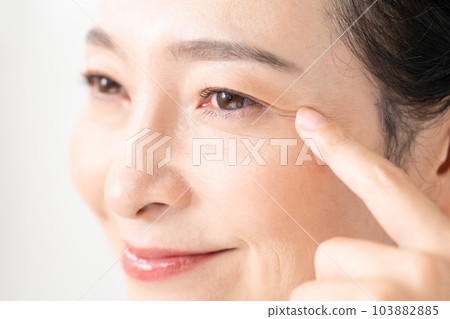 Middle-aged woman around the eyes 103882885