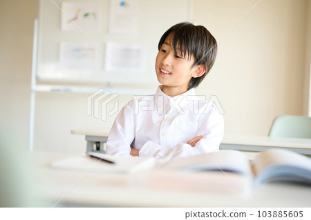 Elementary school boy studying Elementary school boy studying 103885605