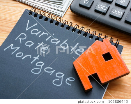 Note with inscription variable rate mortgage VRM and model of house. 103886443