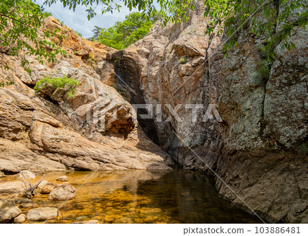 Sunny view of the Post Oak Waterfall landscape of Wichita Mountains 103886481