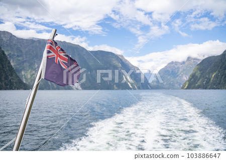 Milford Sound landscape and flag Milford Sound landscape and flag 103886647