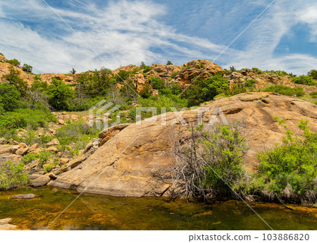 Sunny view of the Treasure Lake landscape of Wichita Mountains 103886820