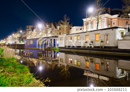 Groningen, Netherlands night Cityscape photographed at night. Groningen during a clear evening. Groningen, Netherlands night Cityscape photographed at night. Groningen during a clear evening. 103888211