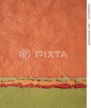 abstract landscape in red, orange and green - collection of Huun papers handmade in Mexico, vertical background 103890501