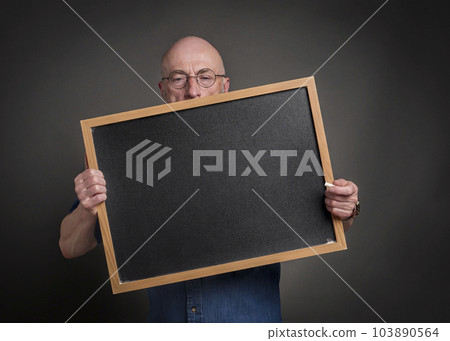 senior man, teacher, mentor or presenter, with blank blackboard, education, presentation and business communication concept senior man, teacher, mentor or presenter, with blank blackboard, education, presentation and business communication concept 103890564