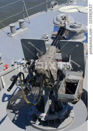 machine gun mounted on a minesweeper machine gun mounted on a minesweeper 103892637