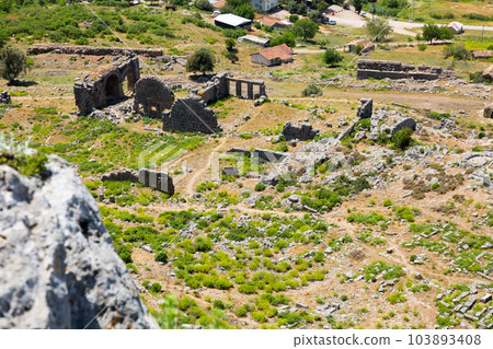 Ruins of ancient city Sillyon. Ancient ruins with roman baths Ruins of ancient city Sillyon. Ancient ruins with roman baths 103893408