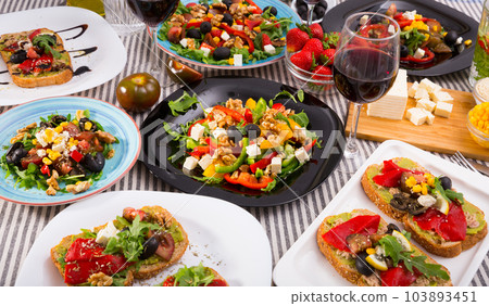 Variety of vegetarian dishes 103893451