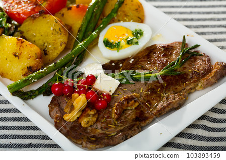 Image of veal with baked vegetables Image of veal with baked vegetables 103893459