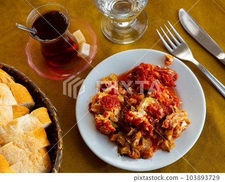 Turkish appetizer Kyopolou from chopped roasted eggplant with garlic 103893729
