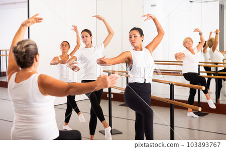 Woman dancing ballet in studio Woman dancing ballet in studio 103893767