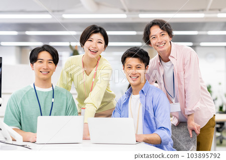 Staff having a meeting in the office 103895792