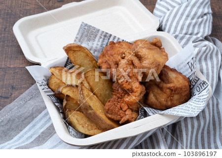 Fried chicken and potato 103896197