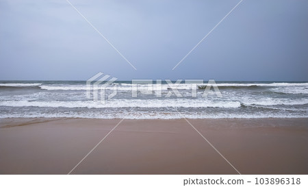 Texture background of sandy beach with gentle soft waves Texture background of sandy beach with gentle soft waves 103896318
