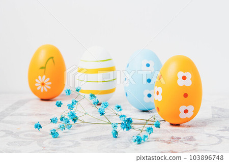 Easter. Multicolored eggs. Yellow and blue Easter decorations. Easter. Multicolored eggs. Yellow and blue Easter decorations. 103896748