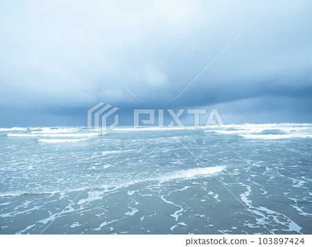 storm over the ocean with wave and beach storm over the ocean with wave and beach 103897424