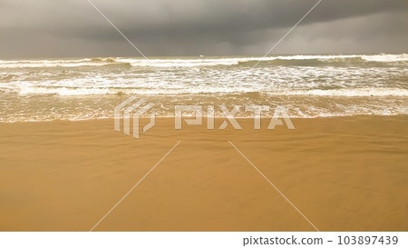 White wave on the sand beach White wave on the sand beach 103897439