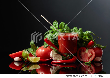 Spicy tomato sauce with ingredients. 103898268
