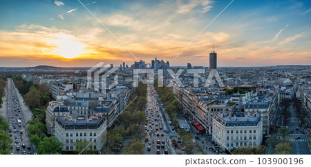 Paris France, high angle view sunset panorama city skyline at La Defense and Champs Elysees street Paris France, high angle view sunset panorama city skyline at La Defense and Champs Elysees street 103900196
