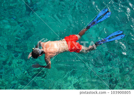 Snorkeling man 103900805