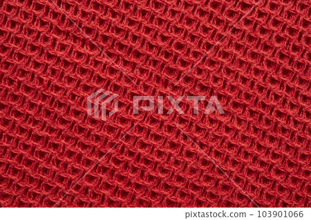 Red knitted cloth wool texture surface background Red knitted cloth wool texture surface background 103901066