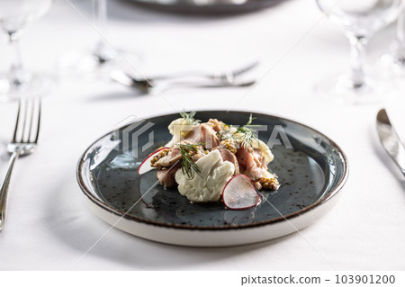 Baked pork with mustard seeds, cauliflower and dressing 103901200