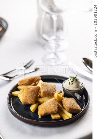 Breaded fried cheese with chips and mayonnaise 103901224