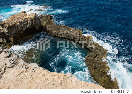 Blue hole and the collapsed Azure window. Gozo, Malta 103903337
