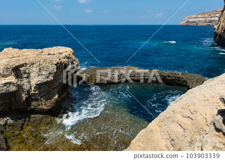 Blue hole and the collapsed Azure window. Gozo, Malta 103903339