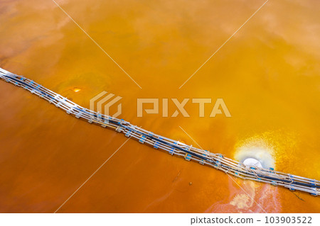 Aerial view of red copper mine water Aerial view of red copper mine water 103903522