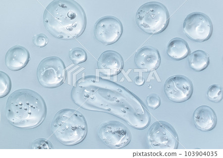 Drops of gel face serum top view. Abstract gel drops for design. Liquid gel moisturizer. 103904035