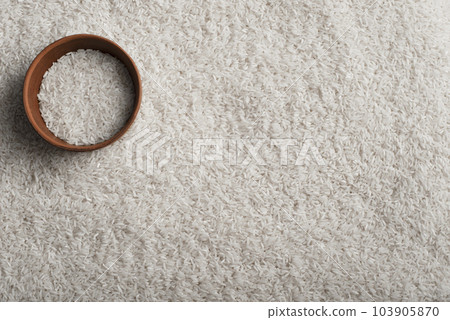 Rice and clay bowl background with copy-space 103905870