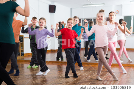 Ordinary children studying contemp dance Ordinary children studying contemp dance 103906819