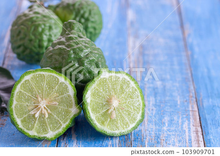Close up bergamot on wooden table background. 103909701
