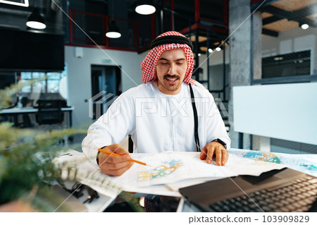Young successful arab businessman working in the office 103909829
