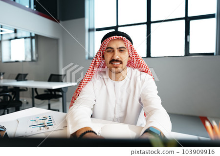 Young successful arab businessman working in the office 103909916
