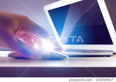 Typing on laptop closeup 103909937