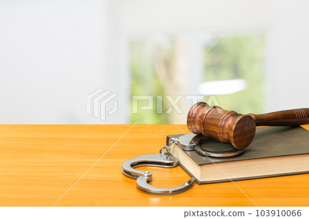 Gavel, books and handcuffs Gavel, books and handcuffs 103910066