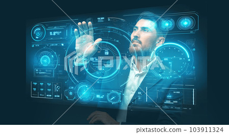 Businessman standing against large media digital screen cyber world concept Businessman standing against large media digital screen cyber world concept 103911324
