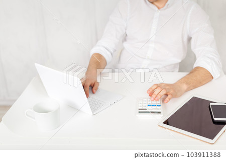 man working on tablet 103911388