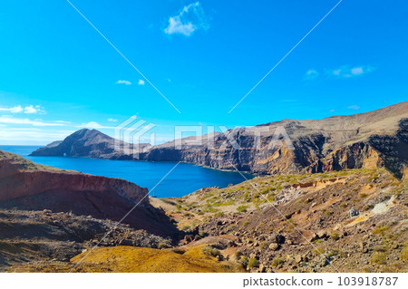 The beautiful coast of the island of Madeira in the Atlantic Ocean. The beautiful coast of the island of Madeira in the Atlantic Ocean. 103918787